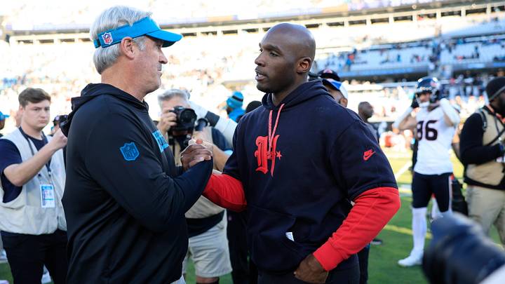 Jacksonville Jaguars head coach Doug Pederson, left, shakes hands with Houston Texans head coach DeMeco Ryans after the game of an NFL football matchup Sunday, Dec. 1, 2024 at EverBank Stadium in Jacksonville, Fla. The Texans held off the Jaguars 23-20. 