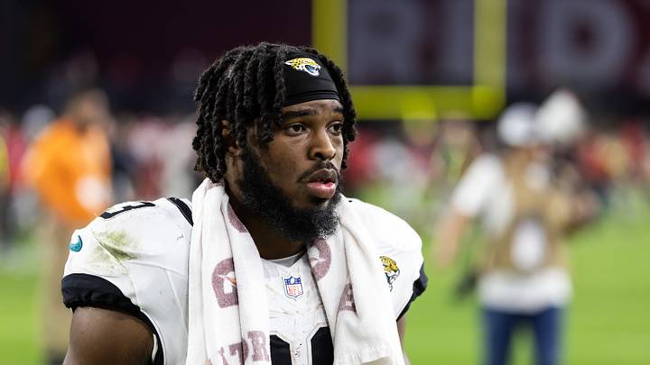 Nov 23, 2025; Glendale, Arizona, USA; Jacksonville Jaguars running back Bhayshul Tuten (33) against the Arizona Cardinals at State Farm Stadium. 
