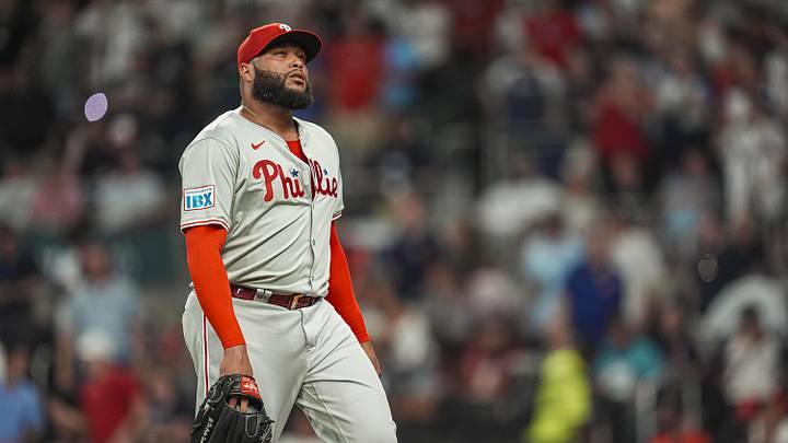 Aug 20, 2024; Cumberland, Georgia, USA; Philadelphia Phillies relief pitcher José Alvarado (46) reacts after walking in a run and being removed from the game against the Atlanta Braves during the ninth inning at Truist Park. Mandatory Credit: Dale Zanine-Imagn Images