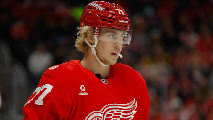 Jan 3, 2026; Detroit, Michigan, USA; Detroit Red Wings defenseman Simon Edvinsson (77) looks on during the first period against the Pittsburgh Penguins at Little Caesars Arena. Mandatory Credit: Brian Bradshaw Sevald-Imagn Images