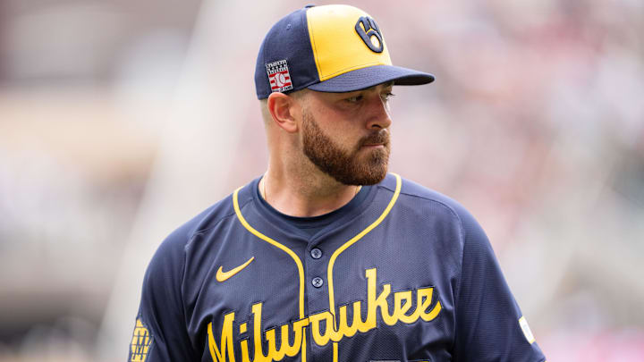 Jul 21, 2024; Minneapolis, Minnesota, USA; Milwaukee Brewers pitcher Aaron Civale (32) walks to the dugout after the fourth inning against the Minnesota Twins at Target Field. Mandatory Credit: Matt Blewett-Imagn Images