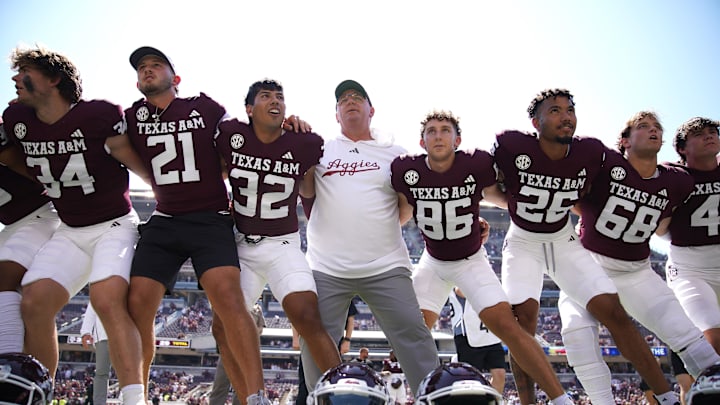 Sep 7, 2024; College Station, Texas, USA; Texas A&M Aggies head coach Mike Elko celebrates a 52-10 win against the McNeese State Cowboys at Kyle Field. Mandatory Credit: Dustin Safranek-Imagn Images