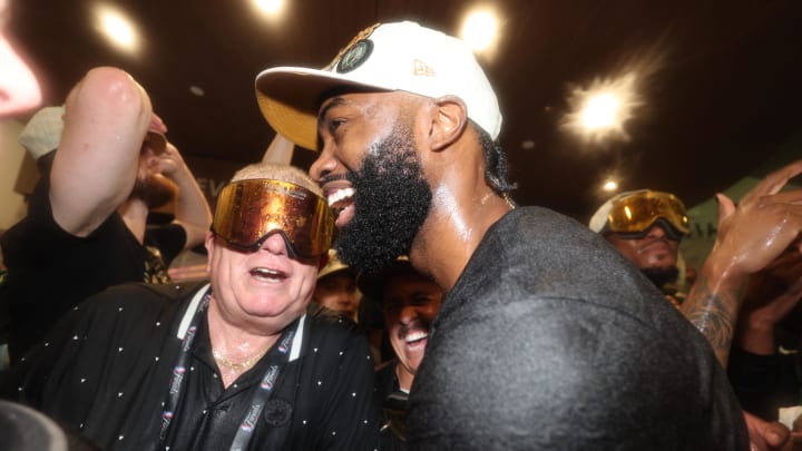 Boston Celtics guard Jaylen Brown (7) celebrates in the locker room after winning the 2024 NBA Finals against the Dallas Mavericks at TD Garden. Mandatory Credit: 