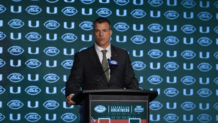 Jul 24, 2024; Charlotte, NC, USA;  Miami Hurricanes head coach Mario Cristobal speaks to the media during the ACC Kickoff at Hilton Charlotte Uptown. Mandatory Credit: Jim Dedmon-USA TODAY Sports