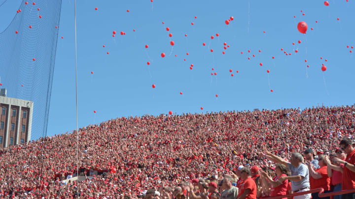 Aug 30, 2014; Lincoln, NE, USA; Nebraska Cornhuskers fans release red balloons after a score during the second half against the Florida Atlantic Owls at Memorial Stadium. Nebraska won 55-7. 