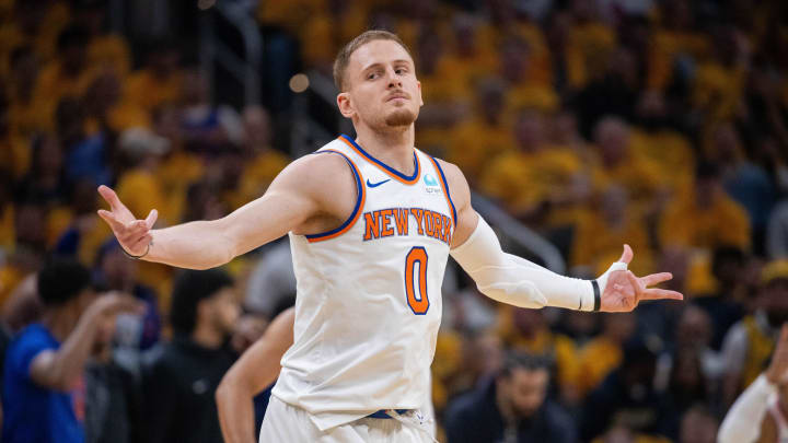 May 17, 2024; Indianapolis, Indiana, USA; New York Knicks guard Donte DiVincenzo (0) reacts after a made basket during game six of the second round for the 2024 NBA playoffs against the Indiana Pacers at Gainbridge Fieldhouse. Mandatory Credit: Trevor Ruszkowski-USA TODAY Sports