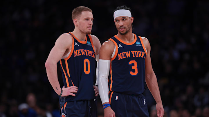 Apr 12, 2024; New York, New York, USA; New York Knicks guard Donte DiVincenzo (0) talks with guard Josh Hart (3) during the second half against the Brooklyn Nets at Madison Square Garden. Mandatory Credit: Vincent Carchietta-USA TODAY Sports