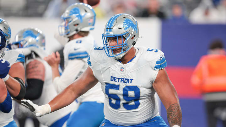 Detroit Lions offensive tackle Giovanni Manu (59).