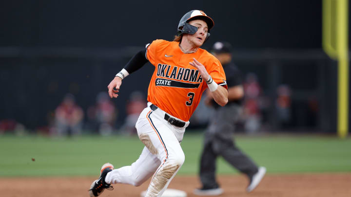 Oklahoma State utility Carson Benge (3) runs to third base during a college baseball game between the Oklahoma State Cowboys and the Oklahoma Sooners at O  Brate Stadium in Stillwater, Okla., on Tuesday, April 18, 2023.