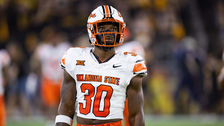 Sep 9, 2023; Tempe, Arizona, USA; Oklahoma State Cowboys linebacker Collin Oliver (30) against the Arizona State Sun Devils at Mountain America Stadium. Mandatory Credit: Mark J. Rebilas-Imagn Images