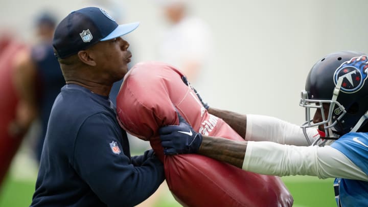 Wide receivers coach Tyke Tolbert runs drills with Calvin Ridley (0) during the Tennessee Titans mandatory mini-camp at Ascension Saint Thomas Sports Park in Nashville, Tenn., Tuesday, June 4, 2024.