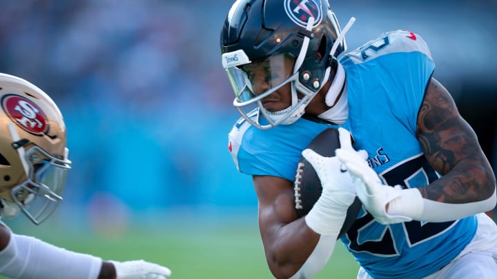 Tennessee Titans running back Tony Pollard (20) runs after a catch during their first preseason game of the 2024-25 season at Nissan Stadium Saturday, Aug. 10, 2024.