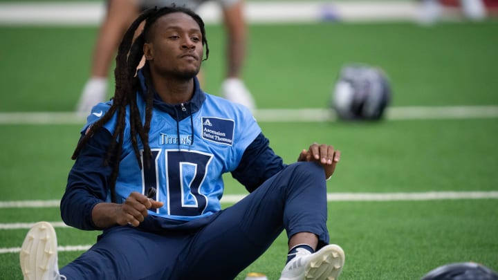 Wide receiver DeAndre Hopkins (10) warms up during the Tennessee Titans mandatory mini-camp at Ascension Saint Thomas Sports Park in Nashville, Tenn., Tuesday, June 4, 2024.