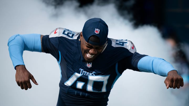 Tennessee Titans linebacker Arden Key takes the field before their game. Tennessee Titans linebacker Arden Key takes the field before their game.