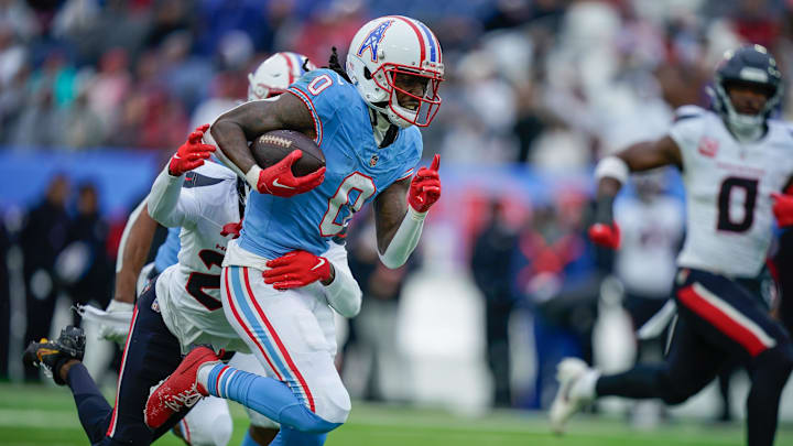 Tennessee Titans wide receiver Calvin Ridley runs after the catch against the Houston Texans. Tennessee Titans wide receiver Calvin Ridley runs after the catch against the Houston Texans.
