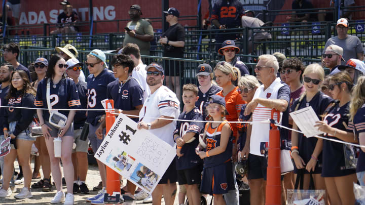 Bears fans at Halas Hall training camp line up for autographs after practice this week.