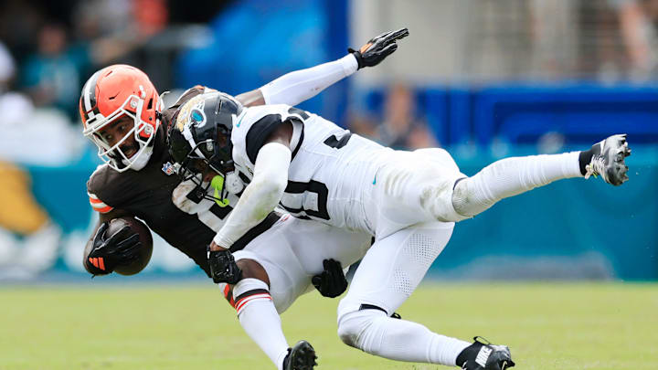 Jacksonville Jaguars cornerback Montaric Brown tackles Cleveland Browns wide receiver Elijah Moore. Jacksonville Jaguars cornerback Montaric Brown tackles Cleveland Browns wide receiver Elijah Moore.