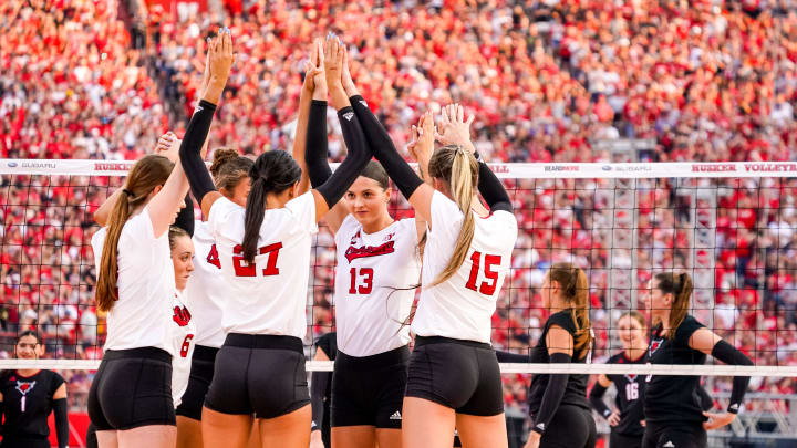 The Nebraska Cornhuskers huddle before the game against the Omaha Mavericks at Memorial Stadium