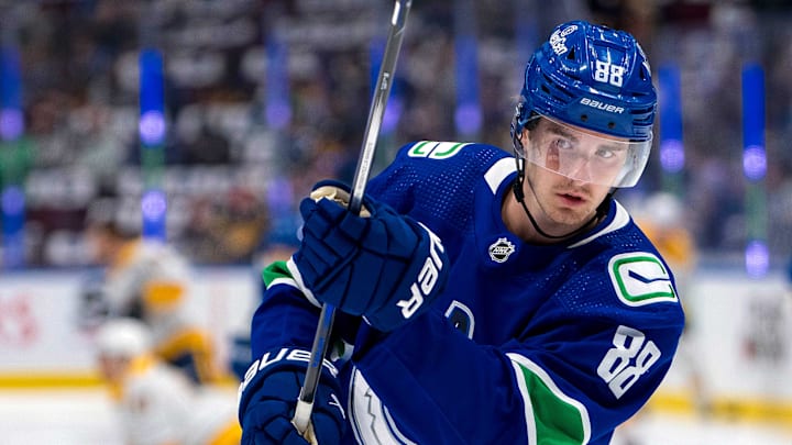Apr 23, 2024; Vancouver, British Columbia, CAN;  Vancouver Canucks forward Nils Aman (88) shoots in warm up prior to game two of the first round of the 2024 Stanley Cup Playoffs against the Nashville Predators at Rogers Arena. Mandatory Credit: Bob Frid-Imagn Images
