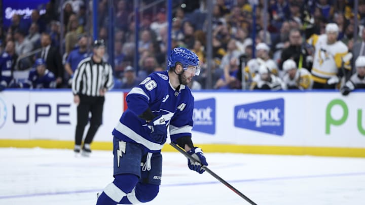 Dec 4, 2025; Tampa, Florida, USA; Tampa Bay Lightning right wing Nikita Kucherov (86) controls the puck against the Pittsburgh Penguins in the third period at Benchmark International Arena. Mandatory Credit: Nathan Ray Seebeck-Imagn Images