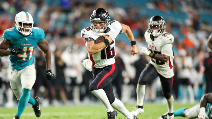 Aug 9, 2024; Miami Gardens, Florida, USA; Atlanta Falcons quarterback Nathan Rourke (16) runs with the ball against the Miami Dolphins in the fourth quarter during preseason at Hard Rock Stadium. Mandatory Credit: Nathan Ray Seebeck-USA TODAY Sports