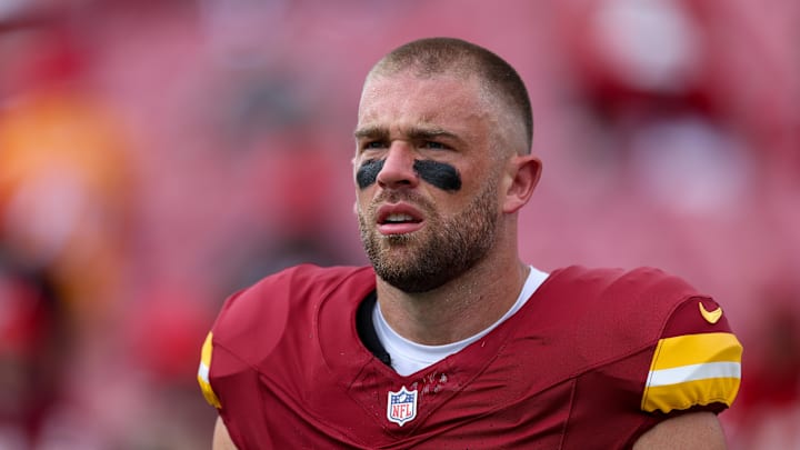 Sep 8, 2024; Tampa, Florida, USA; Washington Commanders tight end Zach Ertz (86) warms up before a game against the Tampa Bay Buccaneers at Raymond James Stadium. Mandatory Credit: Nathan Ray Seebeck-Imagn Images