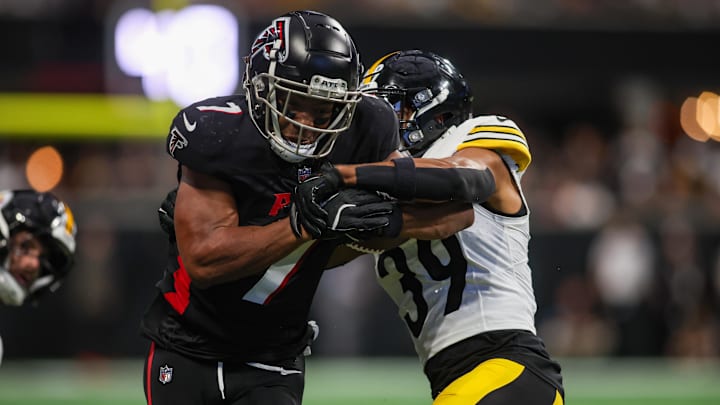 Sep 8, 2024; Atlanta, Georgia, USA; Atlanta Falcons running back Bijan Robinson (7) is tackled by Pittsburgh Steelers safety Minkah Fitzpatrick (39) in the second quarter at Mercedes-Benz Stadium. Mandatory Credit: Brett Davis-Imagn Images