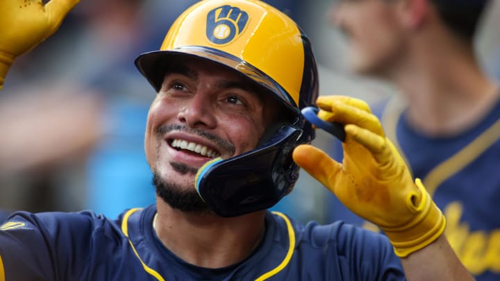 Milwaukee Brewers shortstop Willy Adames (27) celebrates with teammates after a two-run home run against the Atlanta Braves in the first inning at Truist Park on Aug. 6.