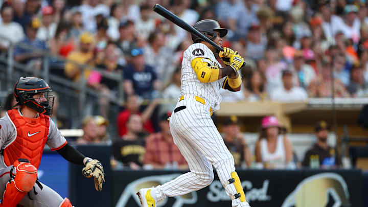 Sep 7, 2024; San Diego, California, USA; San Diego Padres designated hitter Luis Arraez (4) singles during the third inning against the San Francisco Giants at Petco Park.