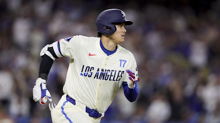 Los Angeles Dodgers designated hitter Shohei Ohtani runs after hitting a solo home-run during the sixth inning of a baseball game against the San Francisco Giants at Dodger Stadium on June 14. Los Angeles Dodgers designated hitter Shohei Ohtani runs after hitting a solo home-run during the sixth inning of a baseball game against the San Francisco Giants at Dodger Stadium on June 14.