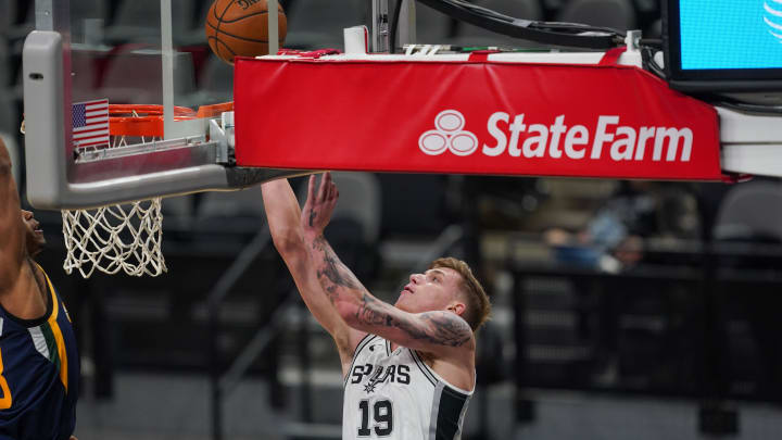 Jan 3, 2021; San Antonio, Texas, USA;  San Antonio Spurs forward Luka Samanic (19) shoots in the second half against the Utah Jazz at the AT&T Center. Mandatory Credit: Daniel Dunn-USA TODAY Sports