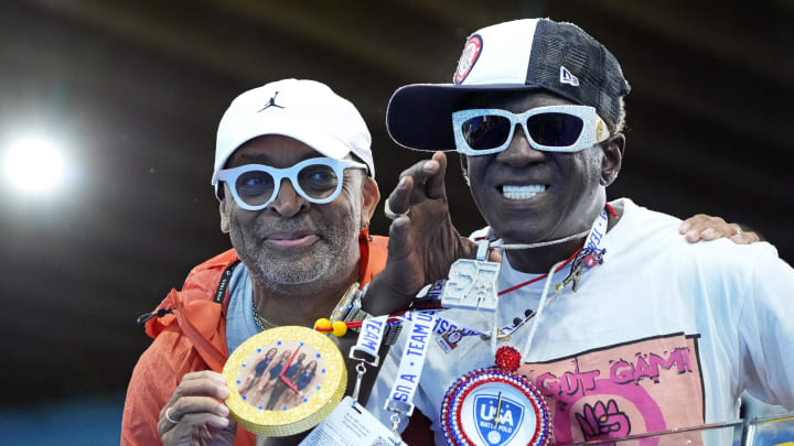 Jul 29, 2024; Paris, France; Film director Spike Lee and recording art Flavor Flav pose for a picture during the match between the United States and Spain in women’s water polo group B play during the Paris 2024 Olympic Summer Games at Aquatics Centre. Mandatory Credit: Andrew P. Scott-USA TODAY Sports
