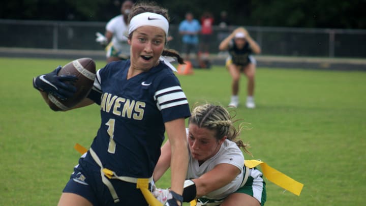 Tampa Alonso receiver Sadie Bode (1) tries to escape a flag pull against Fleming Island at the FHSAA Class 2A high school girls flag football championship on May 13, 2023. [Clayton Freeman/Florida Times-Union]