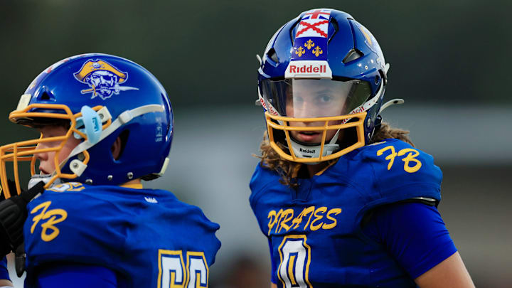 Fernandina Beach's Ian Miller (8) looks on next to Justin Aronowitz (56) during the second quarter of a high school football game Friday, Aug. 16, 2024 at Fernandina Beach High School in Fernandina Beach, Fla. The Zarephath Academy Eagles defeated the Fernandina Beach Pirates 48-14. [Corey Perrine/Florida Times-Union]