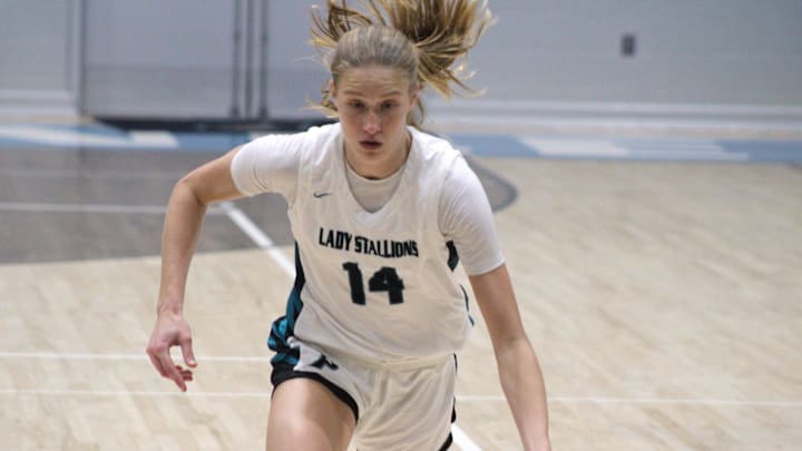 Providence forward Kasey Davey (14) races up the court on the fast break against Bolles during a high school girls basketball game on November 22, 2024. [Clayton Freeman/Florida Times-Union]