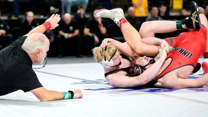 Bettendorf’s Lincoln Jipp pins Linn-Mar’s Philip Jacobs in the 175-pound championship during the Dan Gable Donnybrook wrestling tournament finals Saturday, Dec. 7, 2024 at Xtream Arena in Coralville, Iowa.