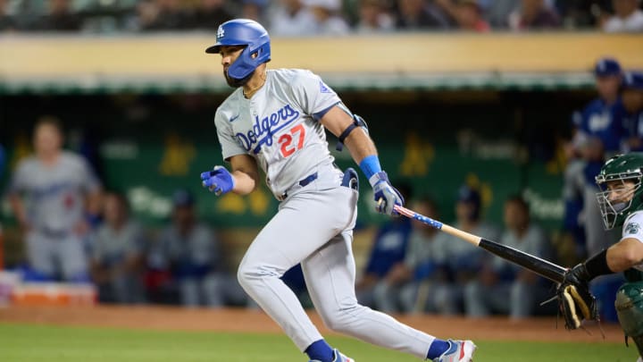 Aug 2, 2024; Oakland, California, USA; Los Angeles Dodgers outfielder Amed Rosario (27) bats against the Oakland Athletics during the seventh inning at Oakland-Alameda County Coliseum. Mandatory Credit: Robert Edwards-USA TODAY Sports