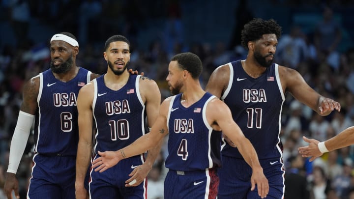 Aug 3, 2024; Villeneuve-d'Ascq, France; United States guard LeBron James (6), small forward Jayson Tatum (10), shooting guard Stephen Curry (4) and center Joel Embiid (11) in the second quarter against Puerto Rico during the Paris 2024 Olympic Summer Games at Stade Pierre-Mauroy. Mandatory Credit: John David Mercer-USA TODAY Sports