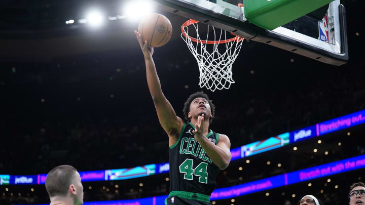 Mar 1, 2024; Boston, Massachusetts, USA; Boston Celtics guard Jaden Springer (44) shoots against the Dallas Mavericks in the second half at TD Garden. Mandatory Credit: David Butler II-USA TODAY Sports