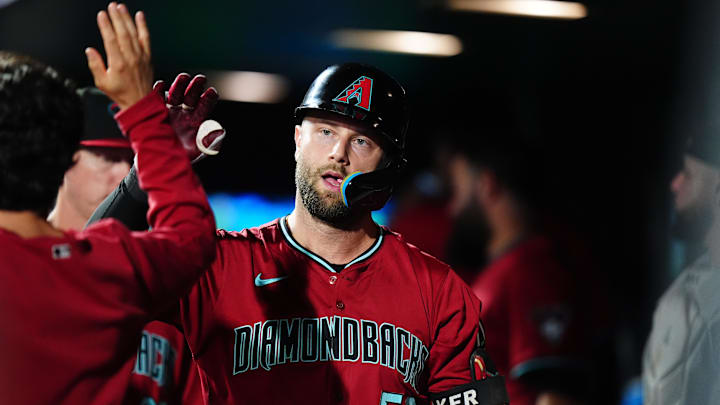 Sep 17, 2024; Denver, Colorado, USA; Arizona Diamondbacks first base Christian Walker (53) celebrates his solo home run in the eighth inning against the Colorado Rockies at Coors Field. Mandatory Credit: Ron Chenoy-Imagn Images