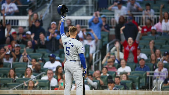 Sep 13, 2024; Atlanta, Georgia, USA; Los Angeles Dodgers first baseman Freddie Freeman (5) acknowledges the crowd before an at bat against the Atlanta Braves in the first inning at Truist Park. Mandatory Credit: Brett Davis-Imagn Images