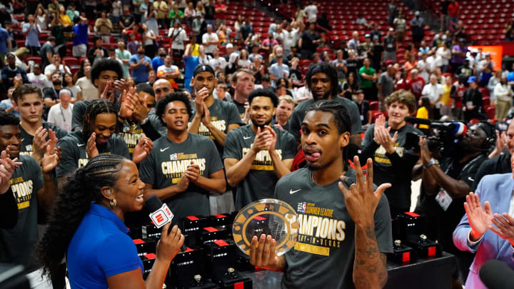 Jul 22, 2024; Las Vegas, NV, USA; Miami Heat guard Josh Christopher (53) celebrates with the NBA 2K23 Summer League MVP trophy after defeating the Memphis Grizzlies in overtime at Thomas & Mack Center. Mandatory Credit: Lucas Peltier-USA TODAY Sports