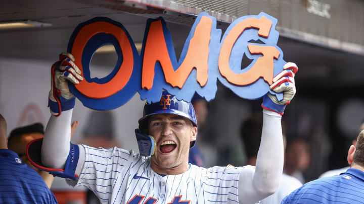 Jun 30, 2024; New York City, New York, USA;  New York Mets center fielder Brandon Nimmo (9) celebrates in the dugout after hitting a two run home run to tie the game in the seventh inning against the Houston Astros at Citi Field. Mandatory Credit: Wendell Cruz-USA TODAY Sports