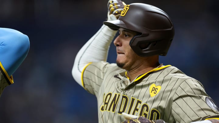 Aug 30, 2024; St. Petersburg, Florida, USA; San Diego Padres designated hitter Manny Machado (13)celebrates after hitting a three run home run against the Tampa Bay Rays in the second inning at Tropicana Field. Mandatory Credit: Nathan Ray Seebeck-USA TODAY Sports