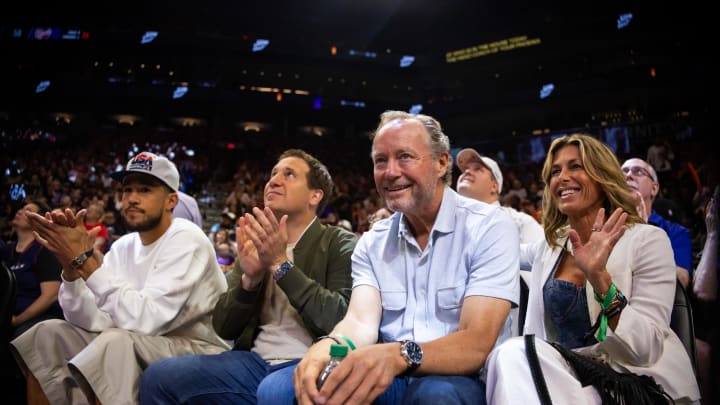 Jun 30, 2024; Phoenix, Arizona, USA; (From left) Phoenix Suns guard Devon Booker with Phoenix Mercury owner Mat Ishbia and Suns head coach Mike Budenholzer during the game between the Indiana Fever and the Phoenix Mercury at Footprint Center. Mandatory Credit: Mark J. Rebilas-USA TODAY Sports