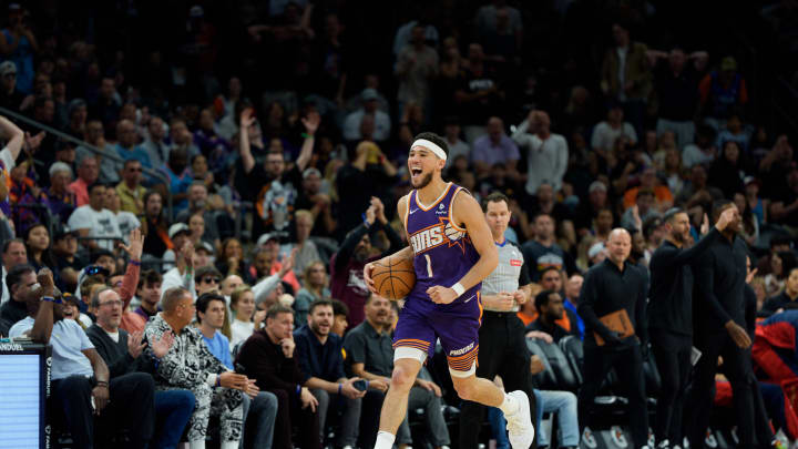 Apr 7, 2024; Phoenix, Arizona, USA;  Phoenix Suns guard Devin Booker (1) reacts after stealing the ball against the New Orleans Pelicans in the second half at Footprint Center. Mandatory Credit: Allan Henry-USA TODAY Sports