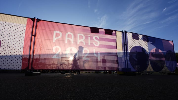 Jul 28, 2024; Vaires-sur-Marne, France;  A general view of logos on a wind screen at the rowing competition during the Paris 2024 Olympic Summer Games at Vaires-sur-Marne Nautical Stadium.