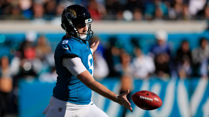 Jacksonville Jaguars punter Logan Cooke (9) punts the ball during the second quarter of a regular season NFL football matchup Sunday, Dec. 31, 2023 at EverBank Stadium in Jacksonville, Fla. The Jacksonville Jaguars blanked the Carolina Panthers 26-0. [Corey Perrine/Florida Times-Union]