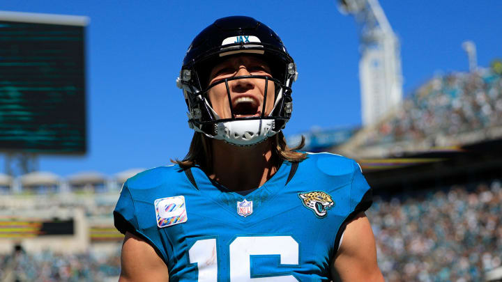 Jacksonville Jaguars quarterback Trevor Lawrence (16) yells after wide receiver Christian Kirk (13), not shown, caught a pass for a touchdown score during the second quarter of an NFL football matchup Sunday, Oct. 15, 2023 at EverBank Stadium in Jacksonville, Fla. The Jacksonville Jaguars defeated the Indianapolis Colts 37-20.