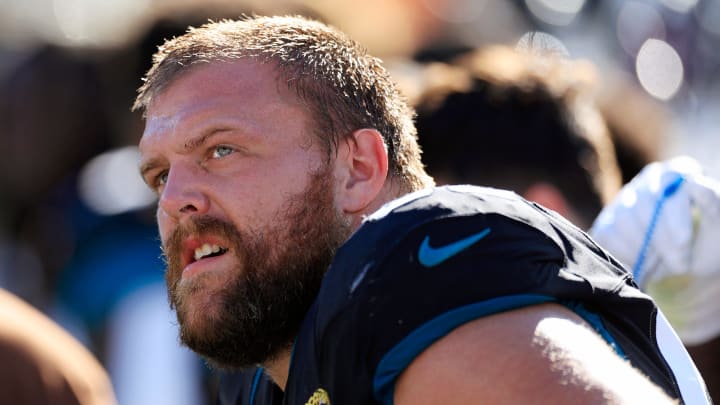 Jacksonville Jaguars guard Brandon Scherff (68) looks on from the sideline during the second quarter an NFL football matchup Sunday, Nov. 19, 2023 at EverBank Stadium in Jacksonville, Fla. The Jacksonville Jaguars defeated the Tennessee Titans 34-14. [Corey Perrine/Florida Times-Union]